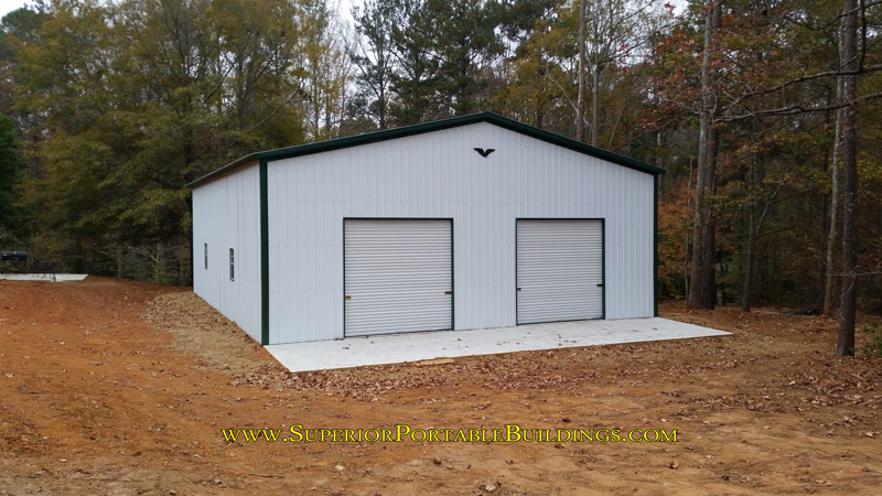 40' wide x 50' long x 13' side metal building and concrete slab