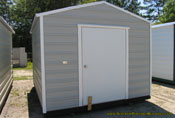 10 x 12 x 7 grey and white portable building.
