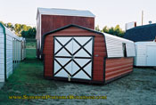 10 x 20 barn red with black trim double doors.
