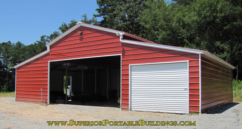 A frame / boxed eve vertical roof metal barn